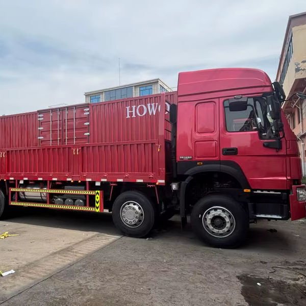 New SINOTRUK HOWO 8x4 Stake Cargo Truck 371HP Heavy Duty Diesel Transport Vehicle with FAST Gearbox Rear Camera for Logistics